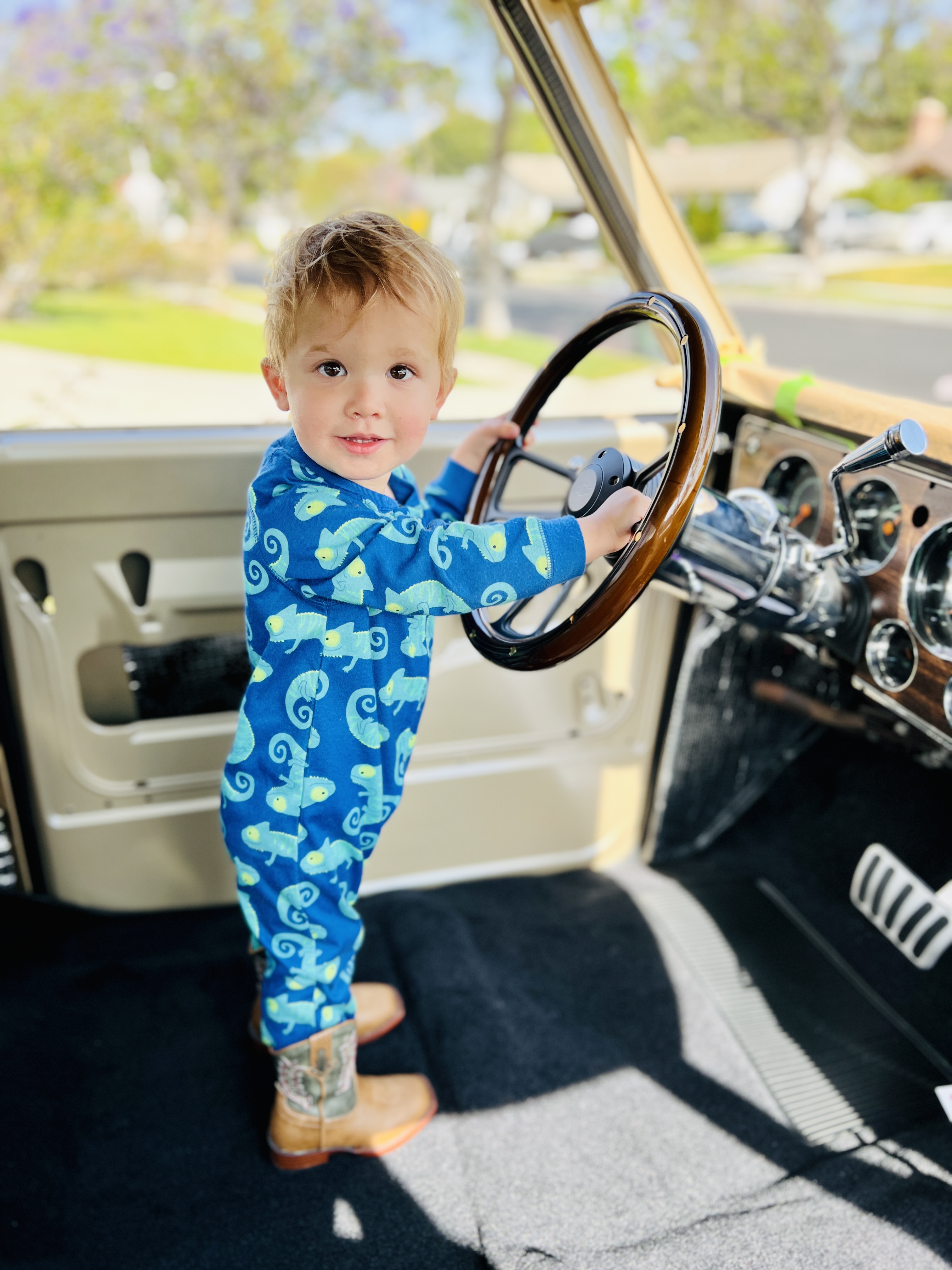 Son enjoying the classic car